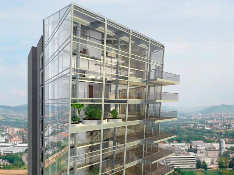 Gewa Tower aus der Nähe, man sieht eine Glasfront mit Bürogebäuden